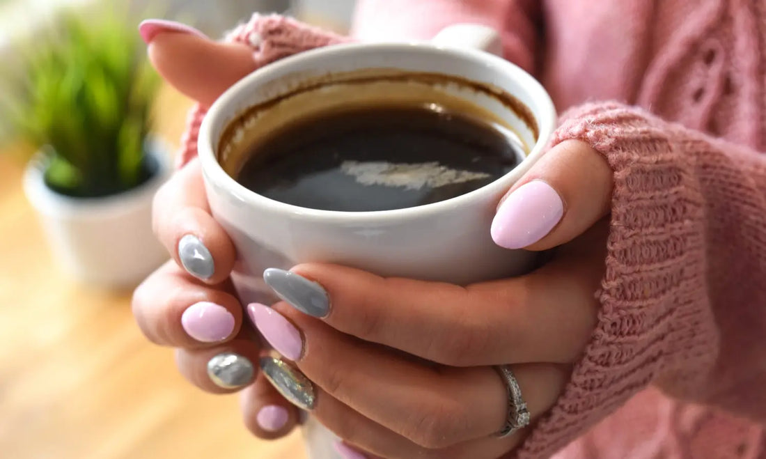 Puraz RAW Collagen Powder beside a morning coffee with a scoop of neutral collagen powder ready to mix