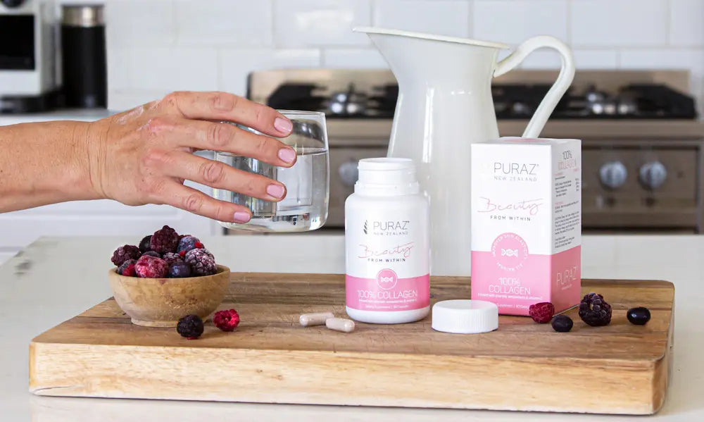 Hairbrush, calendar and Puraz Collagen Infusion Capsules illustrating hair loss supplement choices in NZ