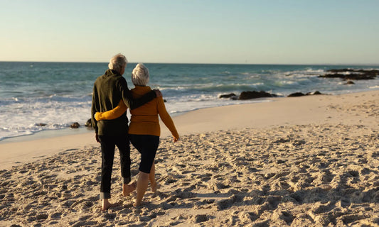 Active adults over 50 walking outdoors as part of a joint health, mobility and active ageing routine