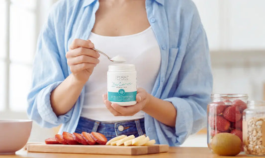 Puraz NZ probiotic for constipation guide with probiotic powder, water and gold kiwifruit