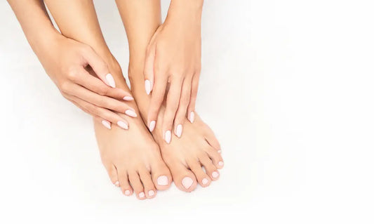 Everyday protein-rich foods beside a natural hand with healthy-looking nails for Puraz NZ.