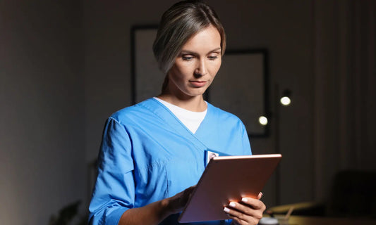 Shift worker preparing a dark quiet room for protected daytime sleep after a night shift