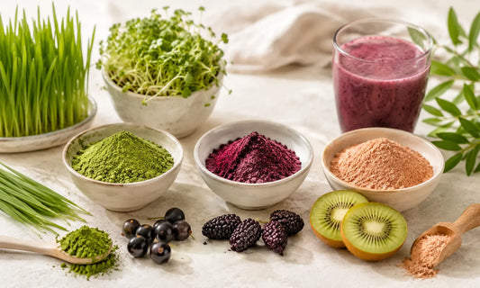 Green powder, berry powder and peach superfood powder ingredients arranged for a Puraz superfoods comparison article
