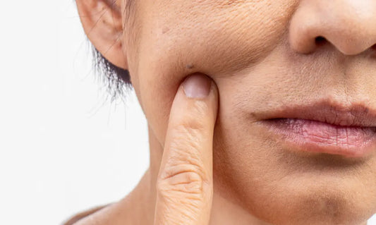 Puraz collagen capsules near the end of a bottle, illustrating what happens when you stop taking collagen.