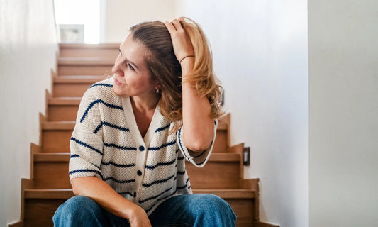 Woman over 40 choosing collagen capsules or powder for a calm perimenopause skin hair nails and joint support routine