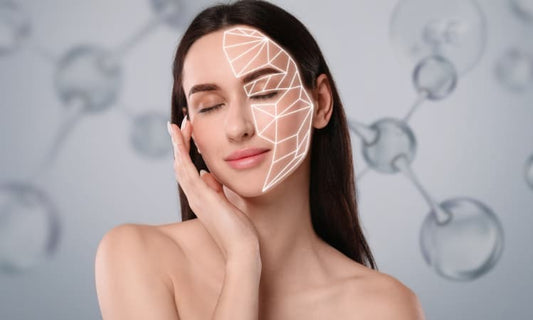 Collagen peptides powder in a scoop beside a glass of water and a coffee mug on a bright kitchen bench.